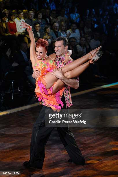Marta Arndt and Lars Riedel perform during the 'Let's Dance' TV Show on March 21, 2012 in Cologne, Germany.