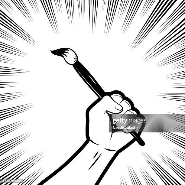 a firm fist holding a paintbrush (brush pen) in the background with comic effects lines - raised fist stock illustrations