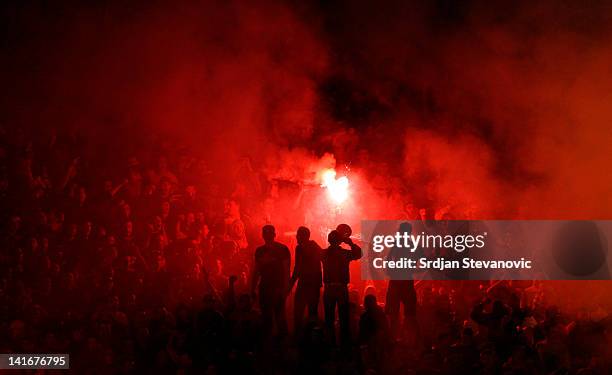 Red Star fans celebrate victory against FC Partizan during the Serbia's national first leg Cup Semi final soccer match Red Star against Partizan on...