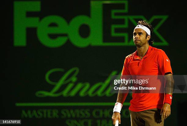 Fernando Gonzalez of Chile in action against Nicolas Mahut of France during Day 3 of the Sony Ericsson Open at Crandon Park Tennis Center on March...