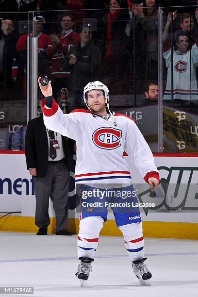 David Desharnais of the Montreal Canadiens salutes the crowd after being named first star of the NHL game against the Ottawa Senators on March 14,...