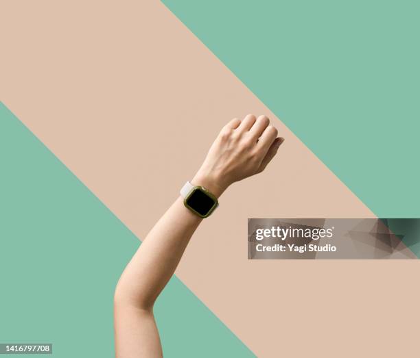 woman using a smart watch - smart watch screen stock pictures, royalty-free photos & images