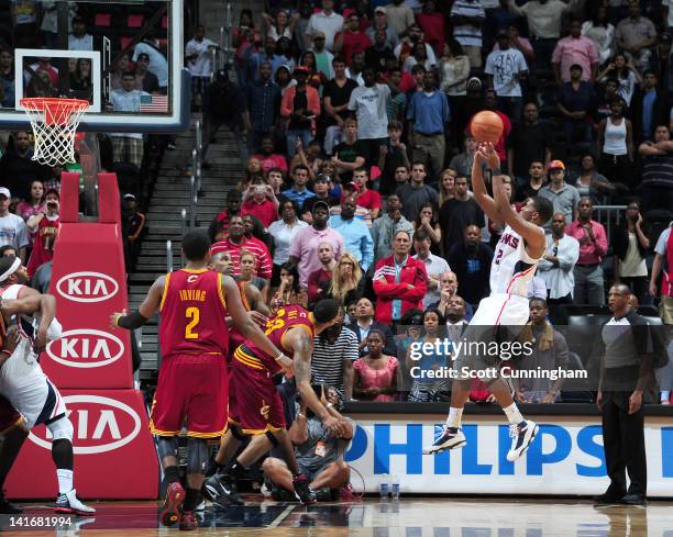 Joe Johnson of the Atlanta Hawks shoots a game-winning shot during the game between the Atlanta Hawks and the Cleveland Cavaliers on March 21, 2012...