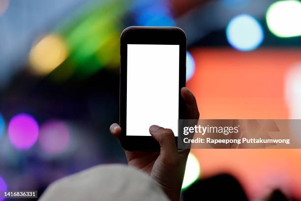 hand holding their smart phones and photographing concert - popular music concert imagens e fotografias de stock