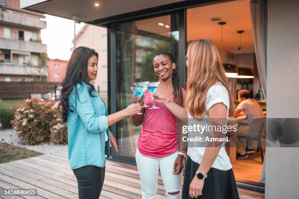 female best friends celebrating at a social party - cocktail party at home stock pictures, royalty-free photos & images