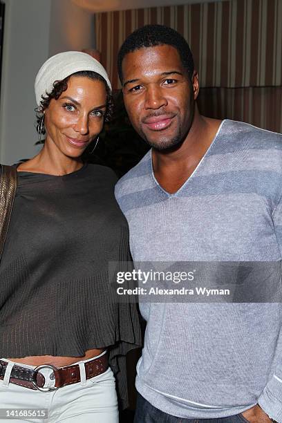 Michael Strahan and wife attend the LACOSTE launch of Women's Spring/Summer 2012 Collection held at The Sunset Tower on March 21, 2012 in West...