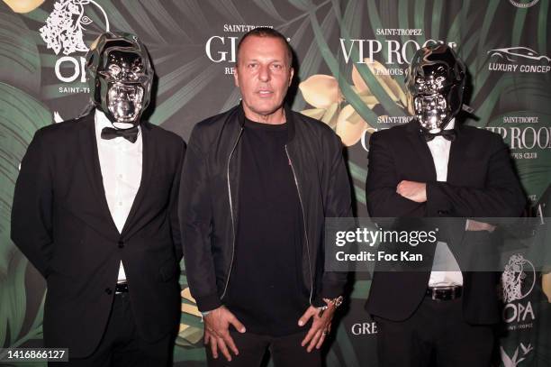 Jean Roch Pedri from VIP Room, Gioia and OPA Saint Tropez surrounded by waiters wearing Richard Orlinski’s sculpted Gorilla face mask attend Richard...