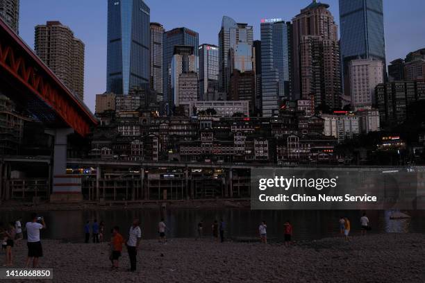 The Hongyadong , a comprehensive wooden stilt houses located at the junction of the Yangtze River and the Jialing River, is seen at night on August...