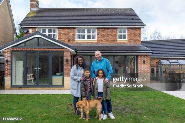 welcome to our home - person with dog looking at camera stock pictures, royalty-free photos & images