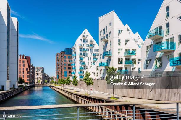 modern apartment flats along canal in aarhus denmark - aarhus stock pictures, royalty-free photos & images