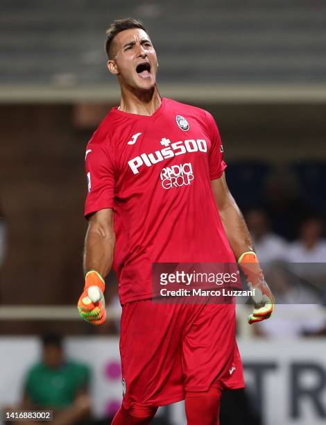 Juan Musso of Atalanta BC celebrates his goal with team-mate during the Serie A match between Atalanta BC and AC Milan at Gewiss Stadium on August...