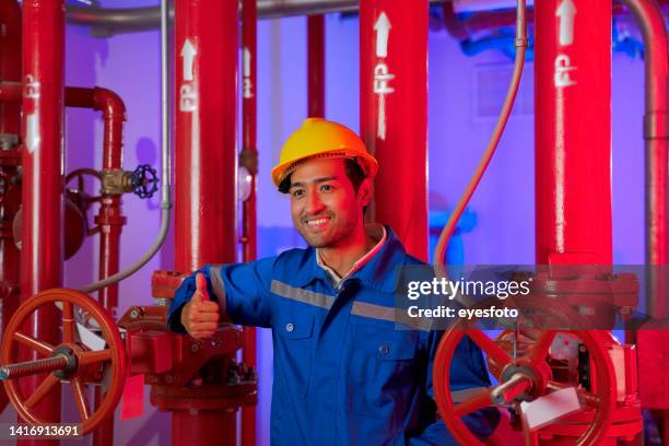 engineer is working in the control room. - hand sign stock pictures, royalty-free photos & images