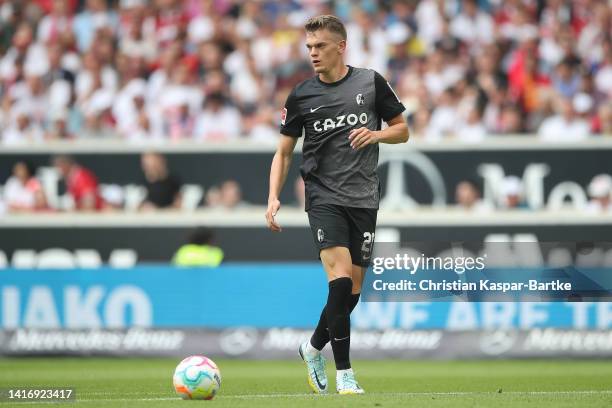 Matthias Ginter of SC Freiburg in action during the Bundesliga match between VfB Stuttgart and Sport-Club Freiburg at Mercedes-Benz Arena on August...