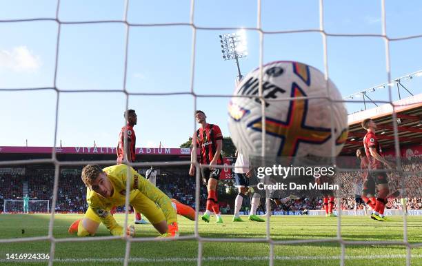 Mark Travers of AFC Bournemouth fails to stop a shot from William Saliba of Arsenal for their third goal during the Premier League match between AFC...