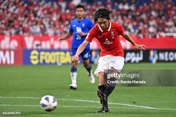 Yoshio Koizumi of Urawa Red Diamonds scores his side's third goal during the AFC Champions League quarter final between Urawa Red Diamonds and BG...