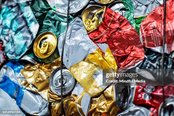 close-up of compacted squares of aluminum cans - läskburk bildbanksfoton och bilder