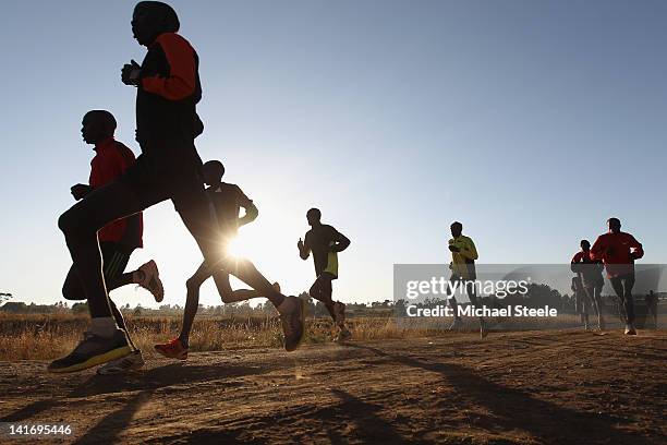 Emmanuel Mutai marathon runner of Kenya and his training group covering a 40km training run on February 2, 2012 in Kaptagat, Kenya.