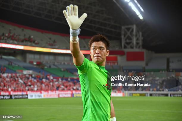 Shusaku Nishikawa of Urawa Red Diamonds applauds fans after his side's 4-0 victory in the AFC Champions League quarter final between Urawa Red...