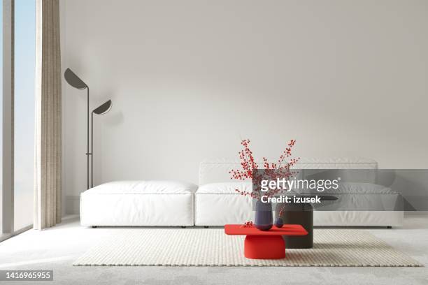 white living room interior - red sofa stock pictures, royalty-free photos & images