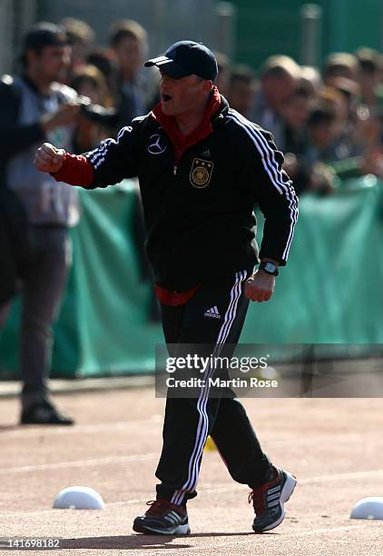 Stefan Boeger, head coach of Germany celebrates after the U17 Men's Elite Round match between Germany and Bulgaria on March 22, 2012 in Bremen,...