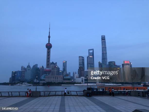 Decorative lights are turned off at the Bund on August 22, 2022 in Shanghai, China. Shanghai will switch off decorative lights for its landmark areas...