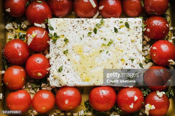 feta pasta recipe background. viral tiktok pasta directly above - griechische küche stock-fotos und bilder