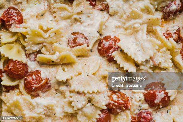 baked feta pasta background. viral tiktok pasta directly above, full frame - casserole stock pictures, royalty-free photos & images