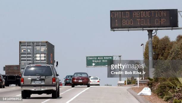 California Department of Transportation highway sign flashes an 'Amber Alert' warning motorists along Interstate 405 to an abduction and vehicle...