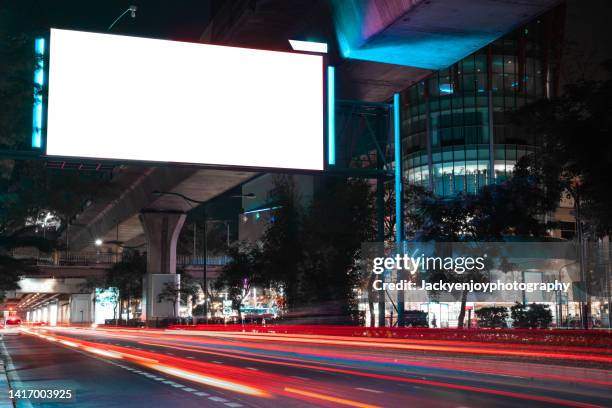 city billboard - bill posting stock pictures, royalty-free photos & images