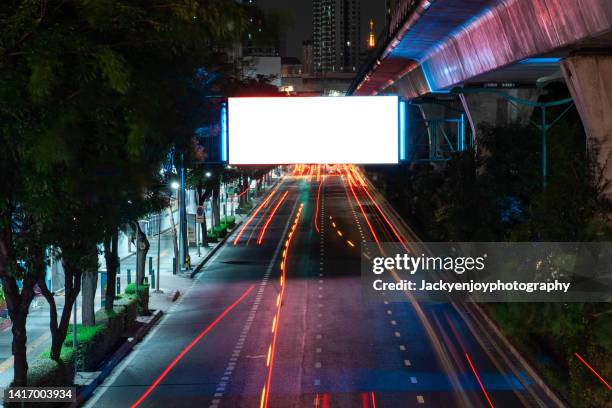 city billboard - bill posting stock pictures, royalty-free photos & images