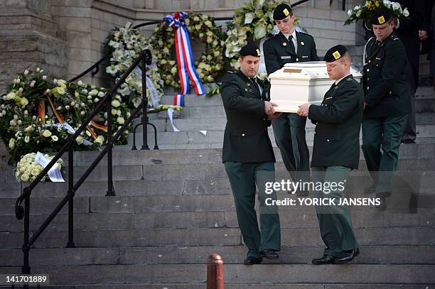 Coffin is carried on March 22, 2012 from the Sint-Pieters church in Leuven after a funeral service for the seven children from Heverlee, who were...