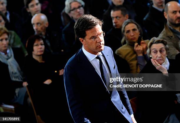 Dutch Prime Minister Mark Rutte arrives on March 22, 2012 at the Sint-Pieters church in Leuven for a funeral service for the seven children from...