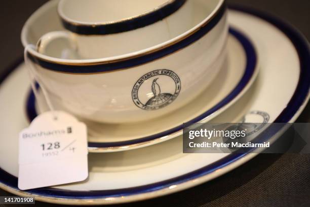 Collection of Dunn Bennett bone china from the ward room of the Terra Nova expedition ship is displayed at Bonhams auctioneers on March 22, 2012 in...