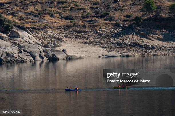 People in kayaks at San Juan Reservoir with water levels decreasing to 60% on August 22, 2022 in Madrid, Spain. Farmers in the wine sector of the...