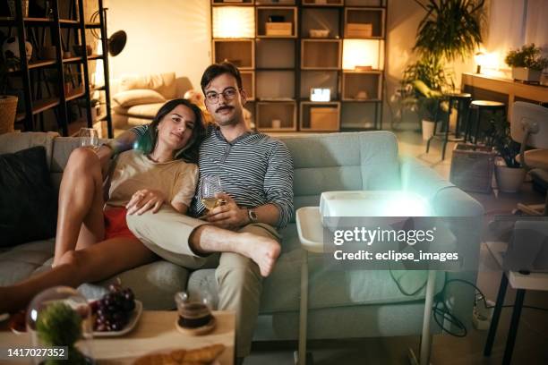 this movie is really good! - projection equipment stock pictures, royalty-free photos & images