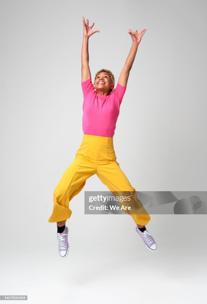 Energetic woman jumping