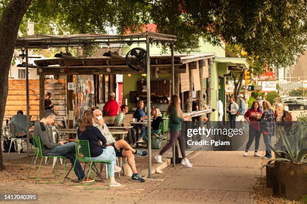 colourful shops and cafés on south congress street in austin texas usa - austin texas bildbanksfoton och bilder