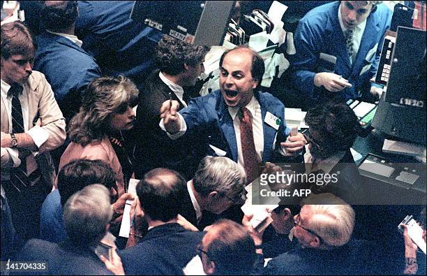 File photo dated 19 October, 1987 shows a trader on the New York Stock Exchange shouting orders as stocks were devastated during one of the most...