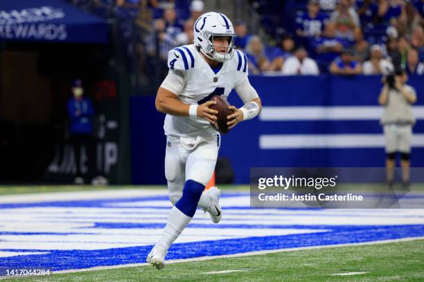 Sam Ehlinger of the Indianapolis Colts in the preseason game against the Detroit Lions at Lucas Oil Stadium on August 20, 2022 in Indianapolis,...