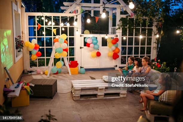 perfect birthday party - backyard movie stock pictures, royalty-free photos & images