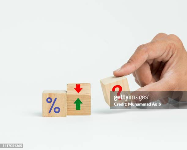 wooden blocks of percentage - financial building blocks stock pictures, royalty-free photos & images