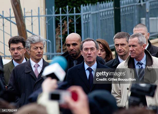 France's Interior Minister Claude Gueant speaks as Paris' prosecutor Francois Molins looks on after an operation to arrest suspected gunman Mohammed...