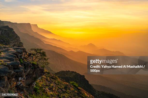 scenic view of mountains against sky during sunset,oman - オマーン ストックフォトと画像