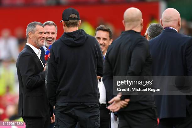 Sky Sports pundits, Roy Keane, Jamie Carragher and Gary Neville speak with Juergen Klopp, Manager of Liverpool prior to the Premier League match...