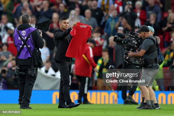 New signing, Casemiro of Manchester United is introduced to fans prior to the Premier League match between Manchester United and Liverpool FC at Old...