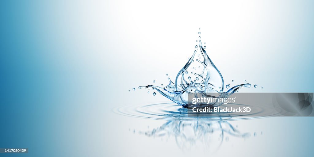 Wasser Drop Splash. Auf blauem Hintergrund.