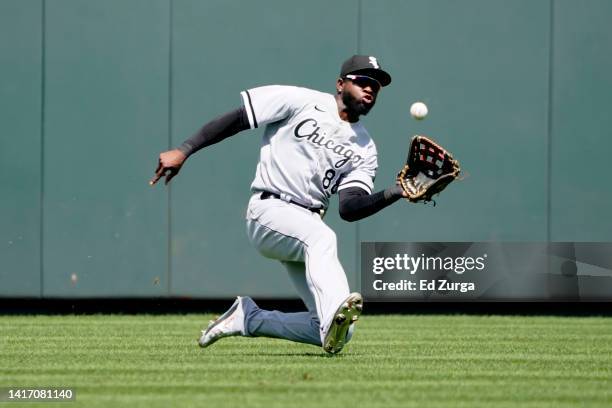 Luis Robert of the Chicago White Sox catches a ball hit by Michael Massey of the Kansas City Royals in the third inning at Kauffman Stadium on August...