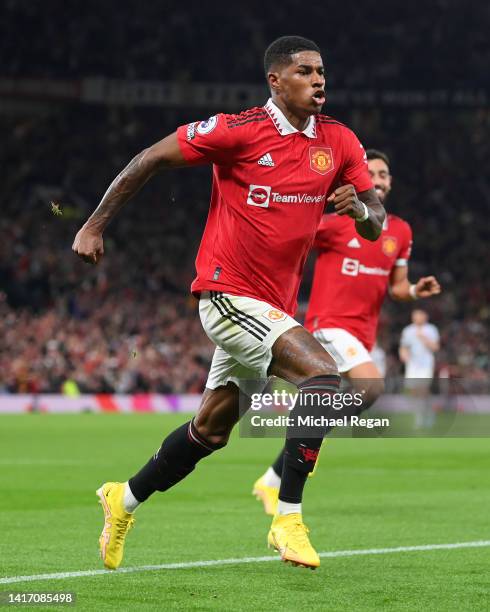 Marcus Rashford of Manchester United celebrates after scoring their team's second goal during the Premier League match between Manchester United and...