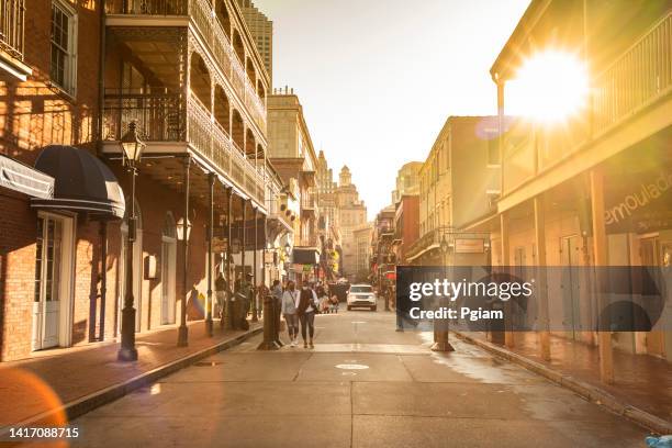 french quarter bars and restaurants on bourbon street new orleans louisiana - bourbon street new orleans stock pictures, royalty-free photos & images