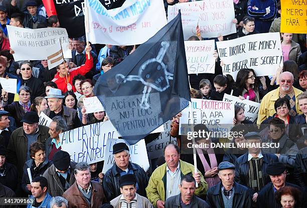 Romanian demonstrators protest against the shale gas exploition in Barlad city, 250 km northeast from Bucharest, on March 22, 2012. Over 1,500 people...